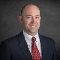 Ryan Thomson headshot edited cropped